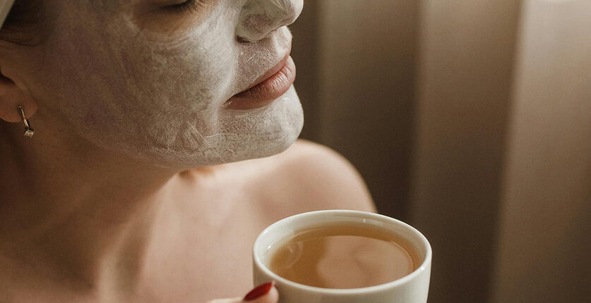 young-woman-having-face-massage-relaxing-spa-salon 1